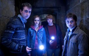 Harry with Hermione, Ron and Neville - from Arts Mic - image source: AP