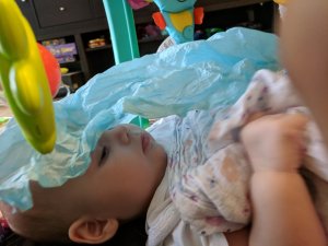 Baby Zoe playing with wrapping paper Baby Zoe playing with wrapping paper