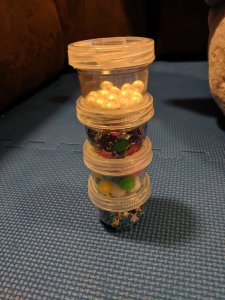 DIY Baby sensory toy rattle shaker pearls and confetti in empty formula containers DIY Baby sensory toy rattle shaker pearls and confetti in empty formula containers